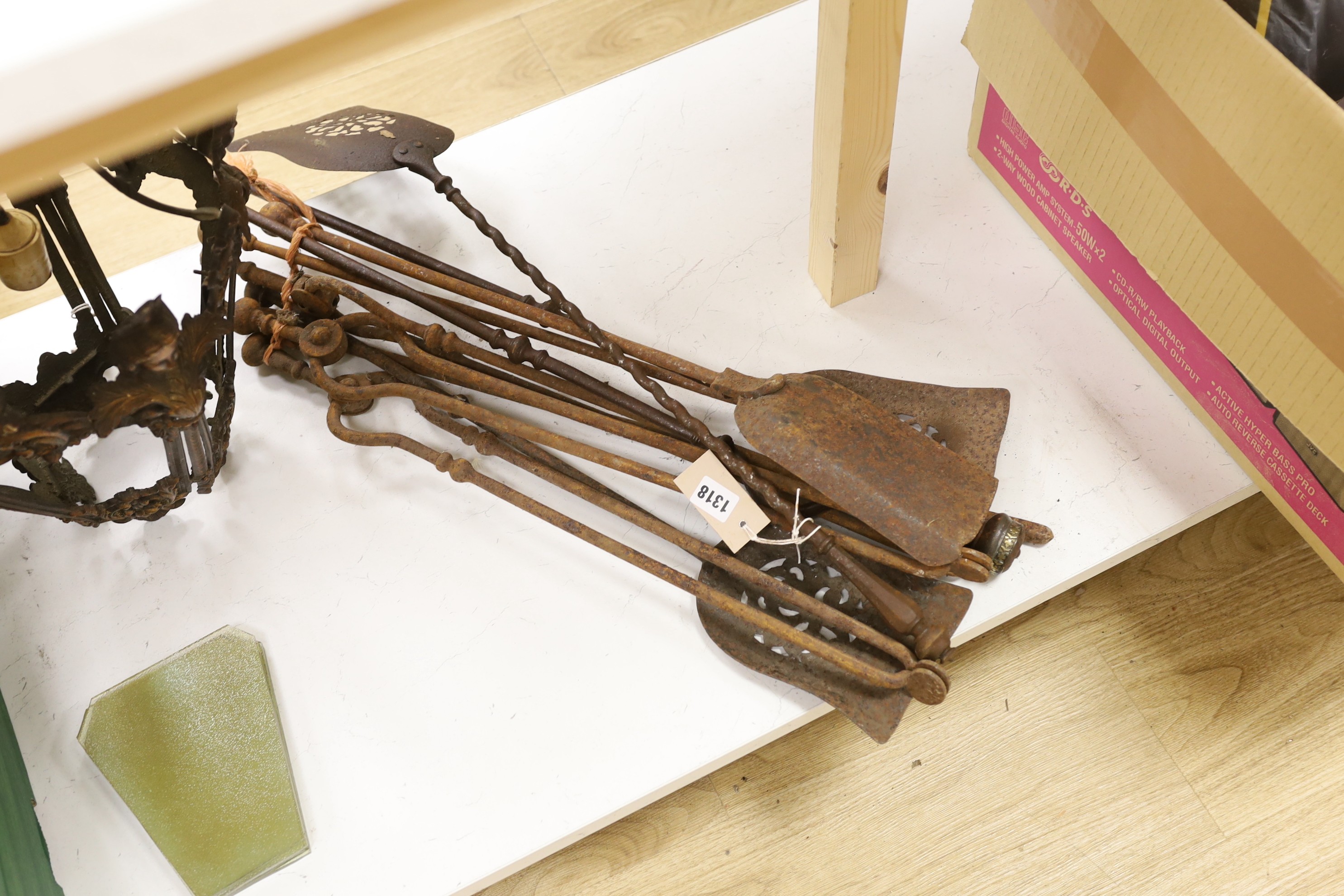 A collection of nine 19th century fire-irons, (some matching)